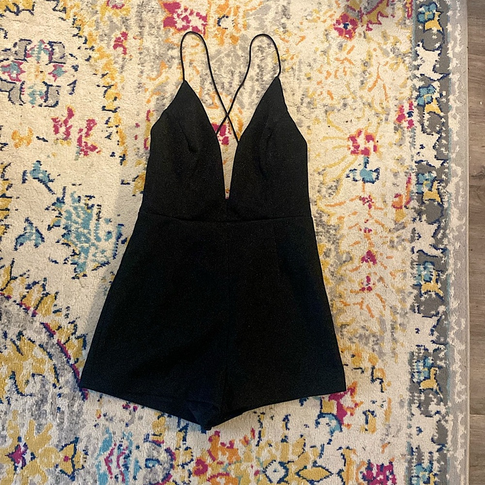Deep plunge black sparkly romper